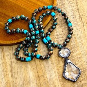 NWOT Bohemian knotted necklace with Glass Pendant